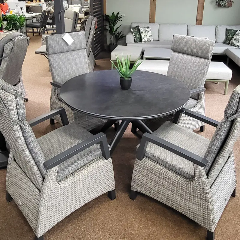 Kendal Four-Seat Grey Sintered Stone Round Dining Set With Pewter All-Weather Cushions – Vila 1