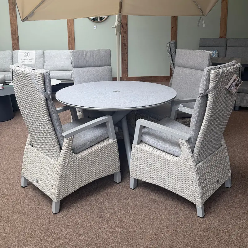 Kendal Four-Seat Natural Sintered Stone Round Dining Set With Ecru All-Weather Cushions – Vila 1
